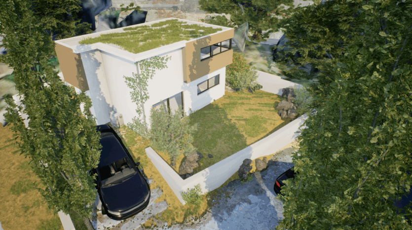 Maison moderne à toit végétalisé avec jardin clos, pelouse, arbres, rochers et deux voitures stationnées.